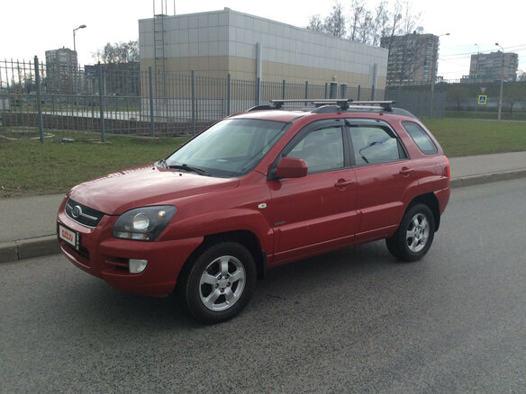 2009 Kia Sportage II Рестайлинг, красный - вид 3