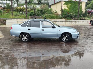 2012 Daewoo Nexia I Рестайлинг, серый, 180000 рублей, вид 4