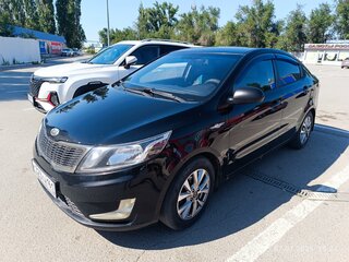 2011 Kia Rio III, чёрный, 575000 рублей, вид 1