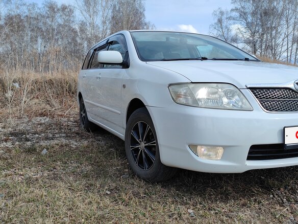 2005 Toyota Corolla Fielder IX (E120, E130) Рестайлинг, белый, 748000 рублей - вид 1