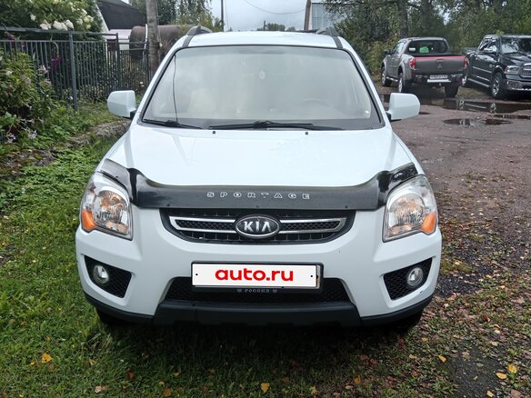 2010 Kia Sportage II Рестайлинг, белый - вид 1