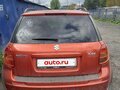 2012 Suzuki SX4 I (Classic) Рестайлинг, оранжевый, 950000 рублей - вид 1