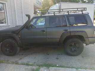 2001 Nissan Patrol V (Y61), серый, 1250000 рублей, вид 4