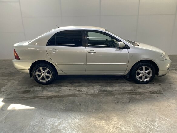 2006 Toyota Corolla IX (E120, E130) Рестайлинг, серебристый - вид 6