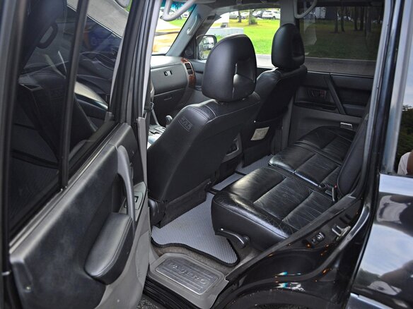 2001 Mitsubishi Montero III, чёрный, 750000 рублей - вид 9