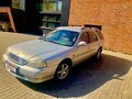 1999 Kia Clarus II, серый, 430000 рублей - вид 1