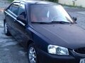 2005 Hyundai Accent ТагАЗ II, чёрный - вид 1