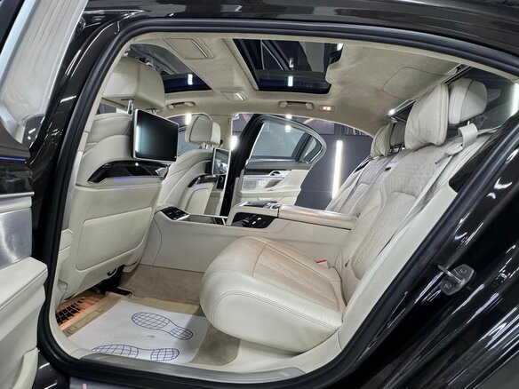 2015 BMW 7 серии Long 750Li xDrive VI (G11/G12), коричневый, 3800000 рублей - вид 34