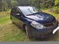 2011 Nissan Tiida I Рестайлинг, синий, 850000 рублей - вид 4