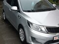 2014 Kia Rio III, серебристый - вид 1