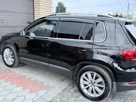 2014 Volkswagen Tiguan I Рестайлинг, чёрный, 1650000 рублей, вид 4
