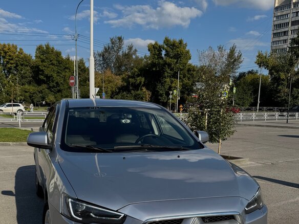 2010 Mitsubishi Lancer X, серебристый, 780000 рублей - вид 2