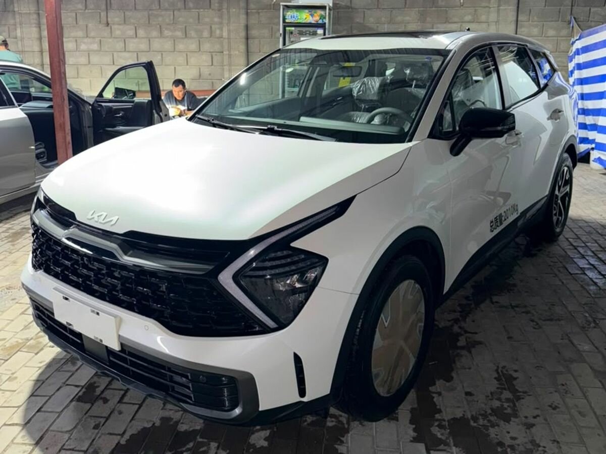 Открыть фотографии: Kia Sportage V