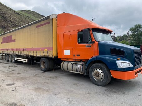 2004 Volvo VNM, оранжевый, 2000000 рублей, вид 2