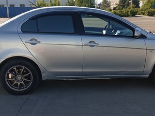 2009 Mitsubishi Lancer X, серебристый, 810000 рублей, вид 2