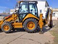 2008 Caterpillar 428, жёлтый, 5500000 рублей - вид 3