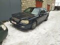 2002 Kia Magentis I, чёрный, 100000 рублей