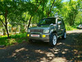 2004 Mitsubishi Pajero Mini II, серебристый - вид 4