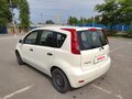2010 Nissan Note I Рестайлинг, белый, 560000 рублей - вид 4