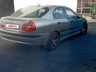 2002 Mitsubishi Carisma I Рестайлинг, серый, 330000 рублей, вид 3
