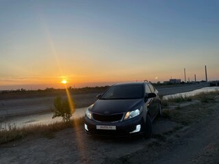 2015 Kia Rio 6-speed III, серый, 1100000 рублей, вид 2