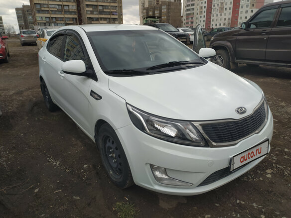 2014 Kia Rio 6-speed III, белый - вид 1