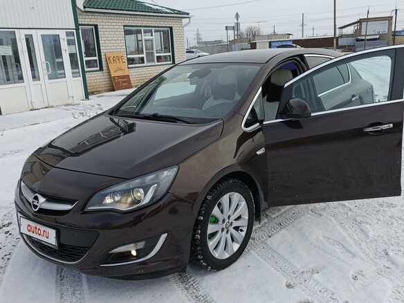 2013 Opel Astra J Рестайлинг, коричневый, 1190000 рублей - вид 4