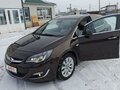 2013 Opel Astra J Рестайлинг, коричневый, 1190000 рублей - вид 4