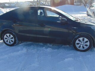 2013 Kia Rio 4-speed III, чёрный, 770000 рублей, вид 3