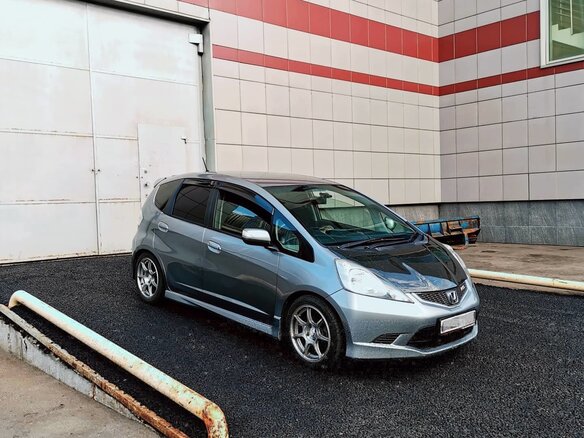 2009 Honda Fit II, серебристый - вид 1