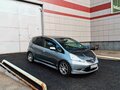 2009 Honda Fit II, серебристый - вид 1