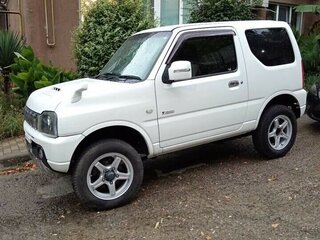 2014 Suzuki Jimny Kei car III Рестайлинг 2, белый, 1350000 рублей, вид 4