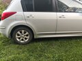 2011 Nissan Tiida I Рестайлинг, серебристый, 900000 рублей - вид 4