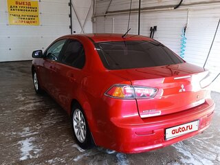 2010 Mitsubishi Lancer X, красный, 650000 рублей, вид 2