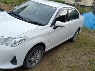 2019 Toyota Corolla Axio XI (E160, E170) Рестайлинг 2, белый, 1650000 рублей, вид 4