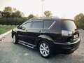 2009 Mitsubishi Outlander II Рестайлинг, чёрный, 1550000 рублей - вид 9
