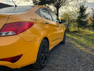 2016 Hyundai Solaris I Рестайлинг, жёлтый, 700000 рублей, вид 3