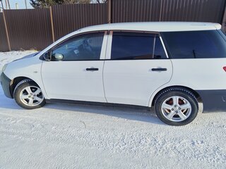 2010 Mazda Familia Y12, белый, 590000 рублей, вид 4