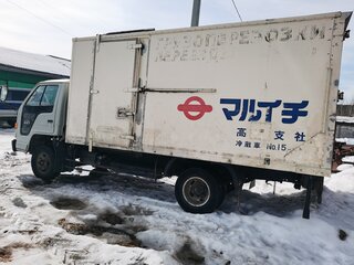 1991 Isuzu Elf (N-series), бежевый, 425000 рублей, вид 3