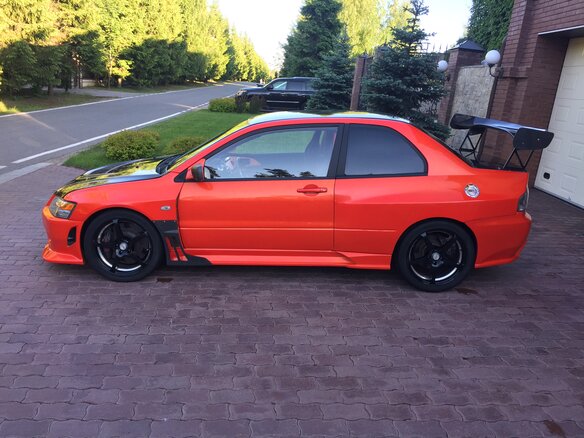 2003 Mitsubishi Lancer Evolution 5-speed VIII, красный