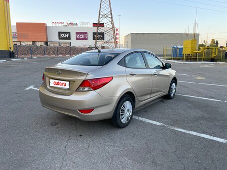 2011 Hyundai Solaris I, золотистый, 590000 рублей, вид 4