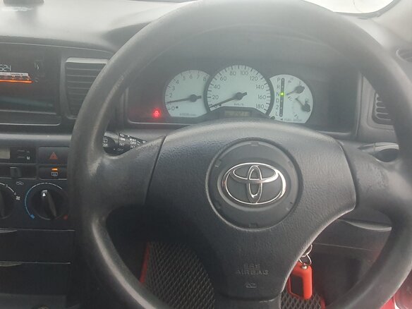 2002 Toyota Corolla Fielder IX (E120, E130), красный, 450000 рублей - вид 5