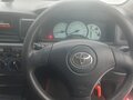 2002 Toyota Corolla Fielder IX (E120, E130), красный, 450000 рублей - вид 5