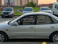 1991 Mitsubishi Mirage IV, серый, 85000 рублей - вид 2