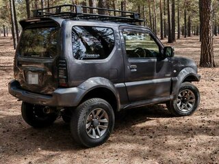 2012 Suzuki Jimny III Рестайлинг 2, серый, 1400000 рублей, вид 4