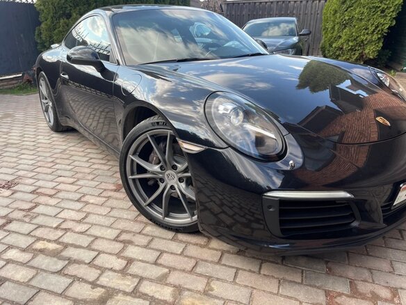 2017 Porsche 911 Carrera VII (991) Рестайлинг, чёрный, 8500000 рублей - вид 1