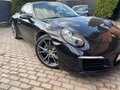 2017 Porsche 911 Carrera VII (991) Рестайлинг, чёрный, 8500000 рублей - вид 1