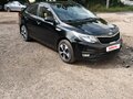 2015 Kia Rio III Рестайлинг, чёрный, 850000 рублей - вид 1