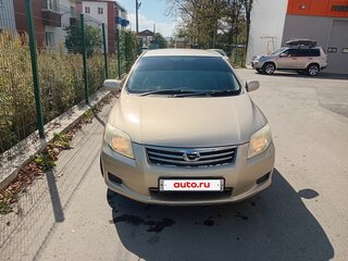 2008 Toyota Corolla Axio X (E140, E150), золотистый, 650000 рублей, вид 1