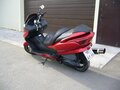 2005 Honda Forza, красный - вид 2
